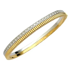 Гривна Boucheron, "Quatre Radiant“, в жълто и бяло злато и диаманти.